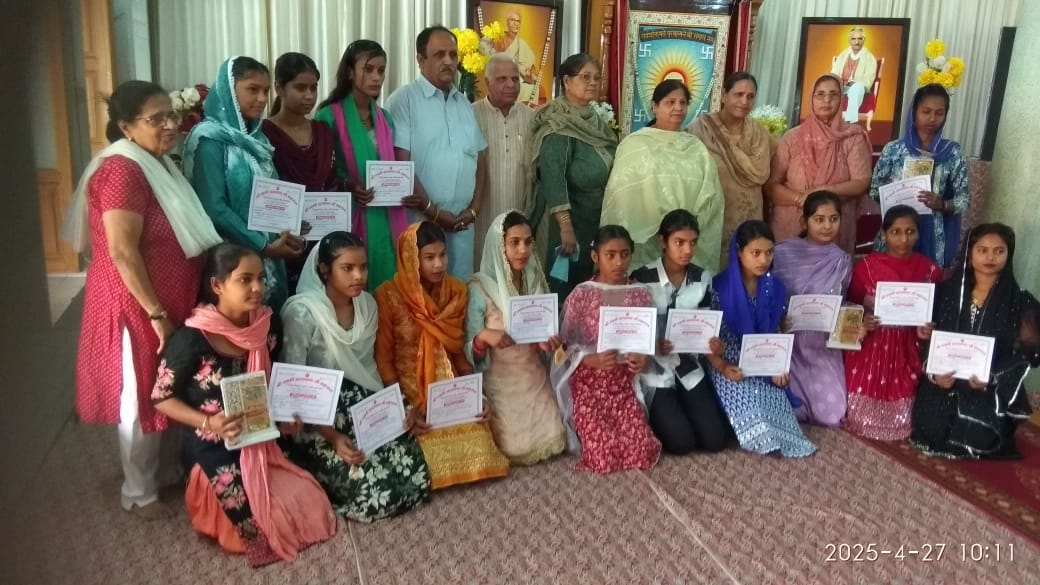 Girls of sewing center were honored.
